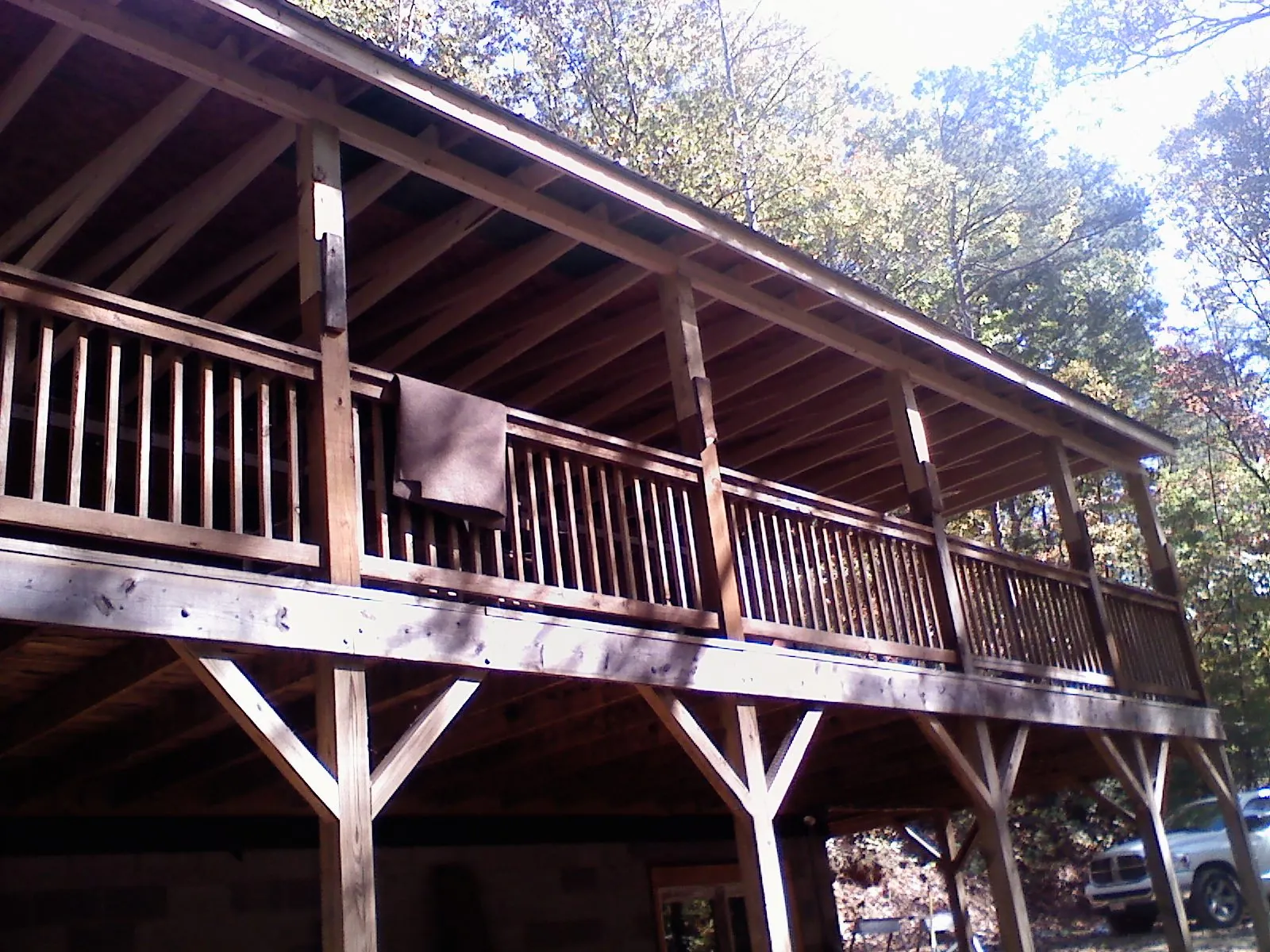 Timber framing under a new elevated porch and deck — Roof Leak Repair in Mountain Lakes by Roofing Brothers